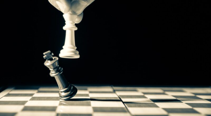 Chess pieces on chess board illustrate the separation of powers.