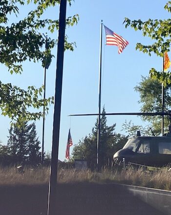 american flag at war memorial