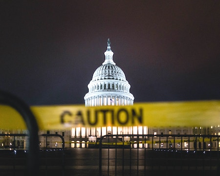 Caution tape in front of the Capitol